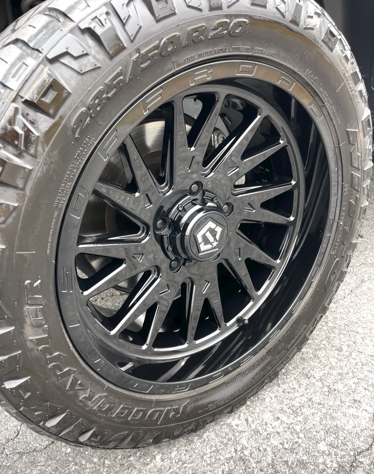 a close up of a tire and wheel on a truck .