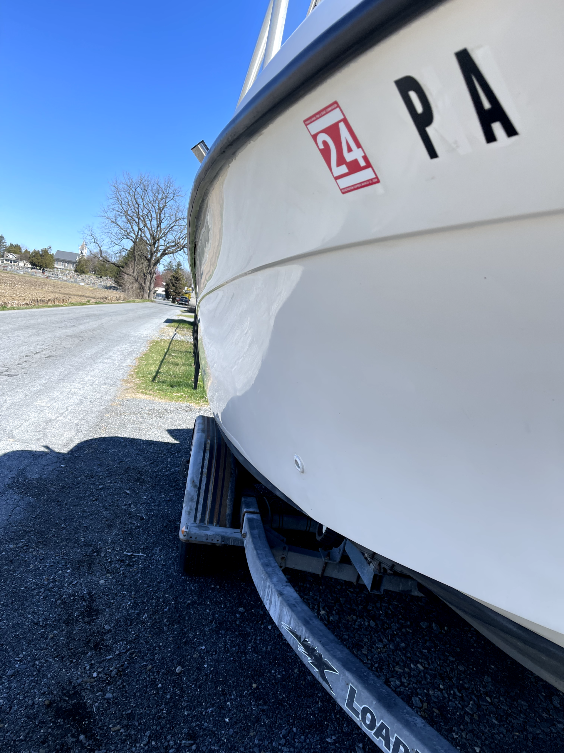 a white boat with pa written on the side