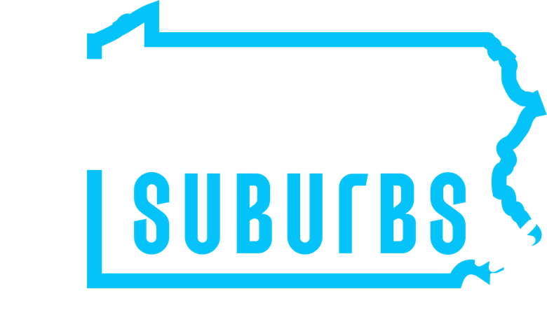 The logo for living in idaho is yellow and orange
