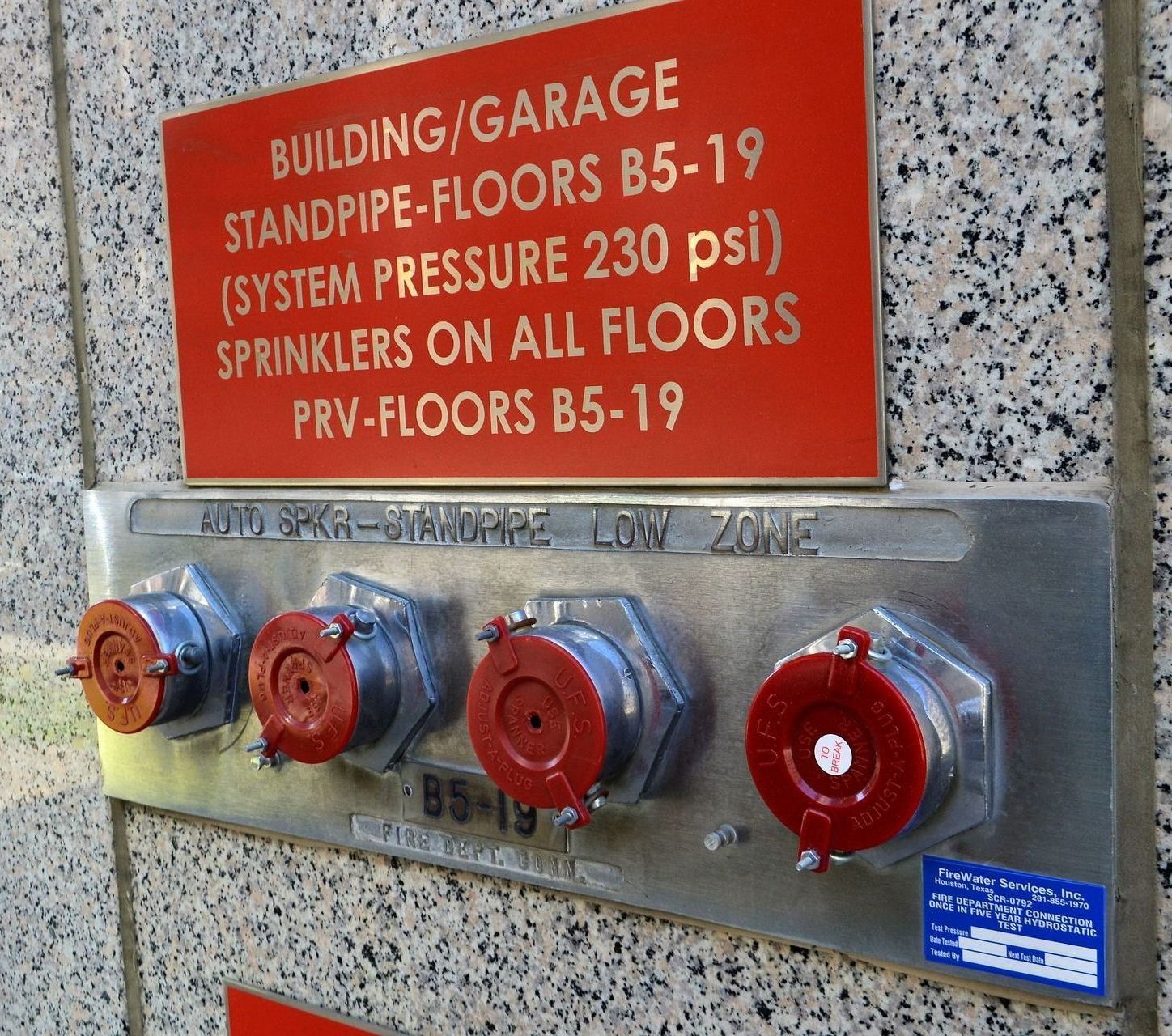 A sign on a wall that says 