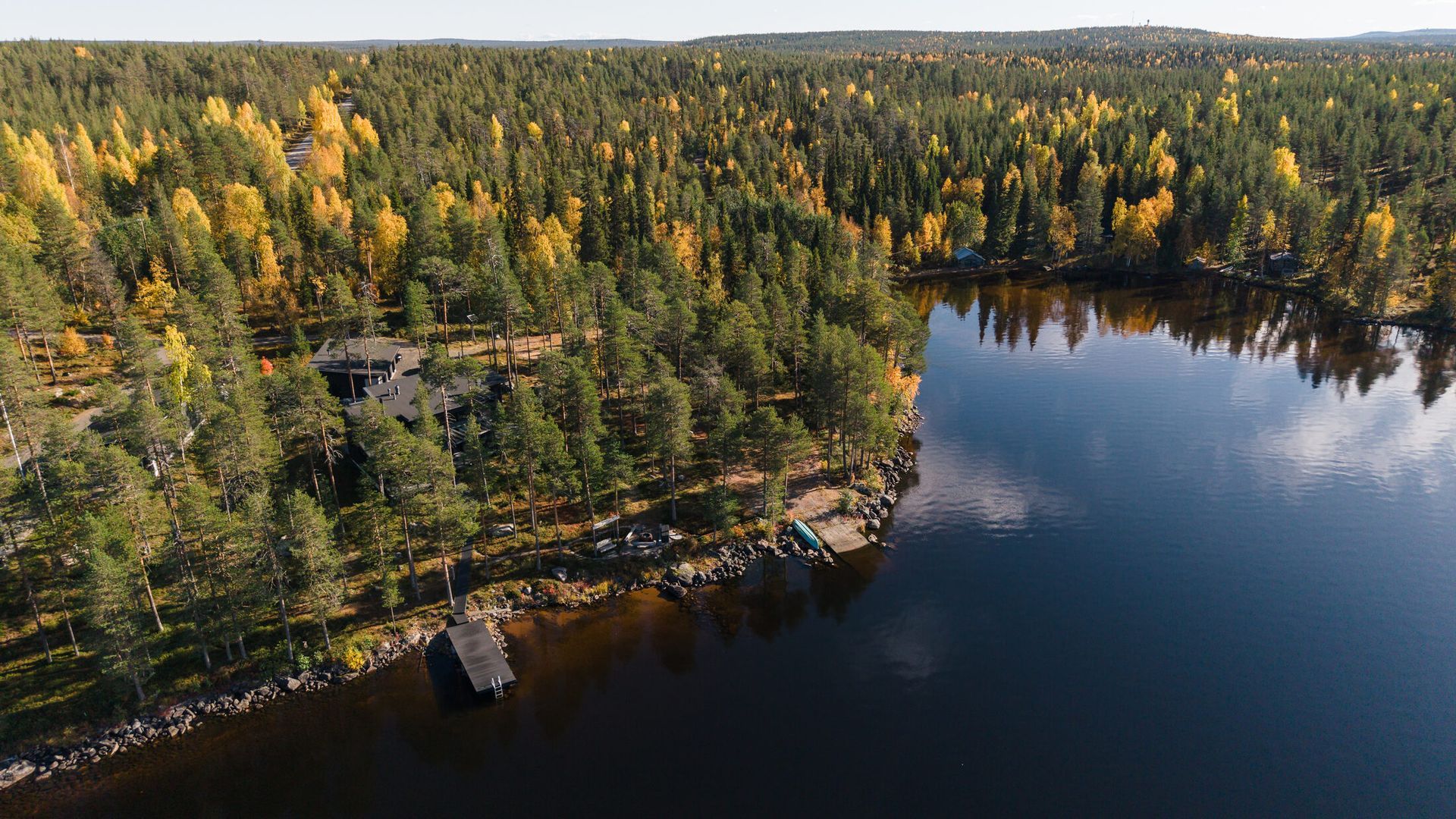Aerial view of a lake and forest in Finnish Lapland
