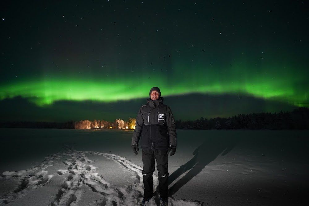 Northern lights over a frozen lake