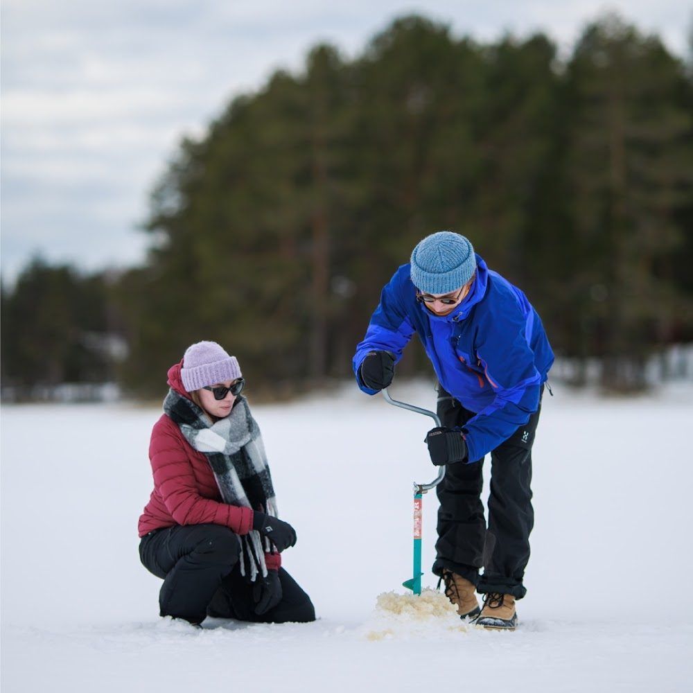 Ice fishing on a frozen lake