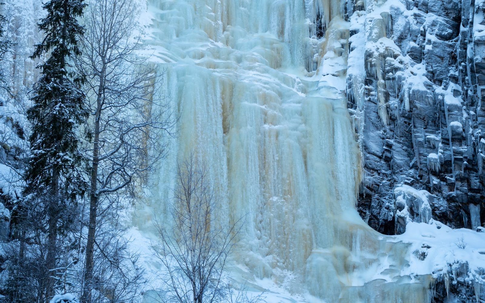 Frozen ice waterfall in Korouoma canyon