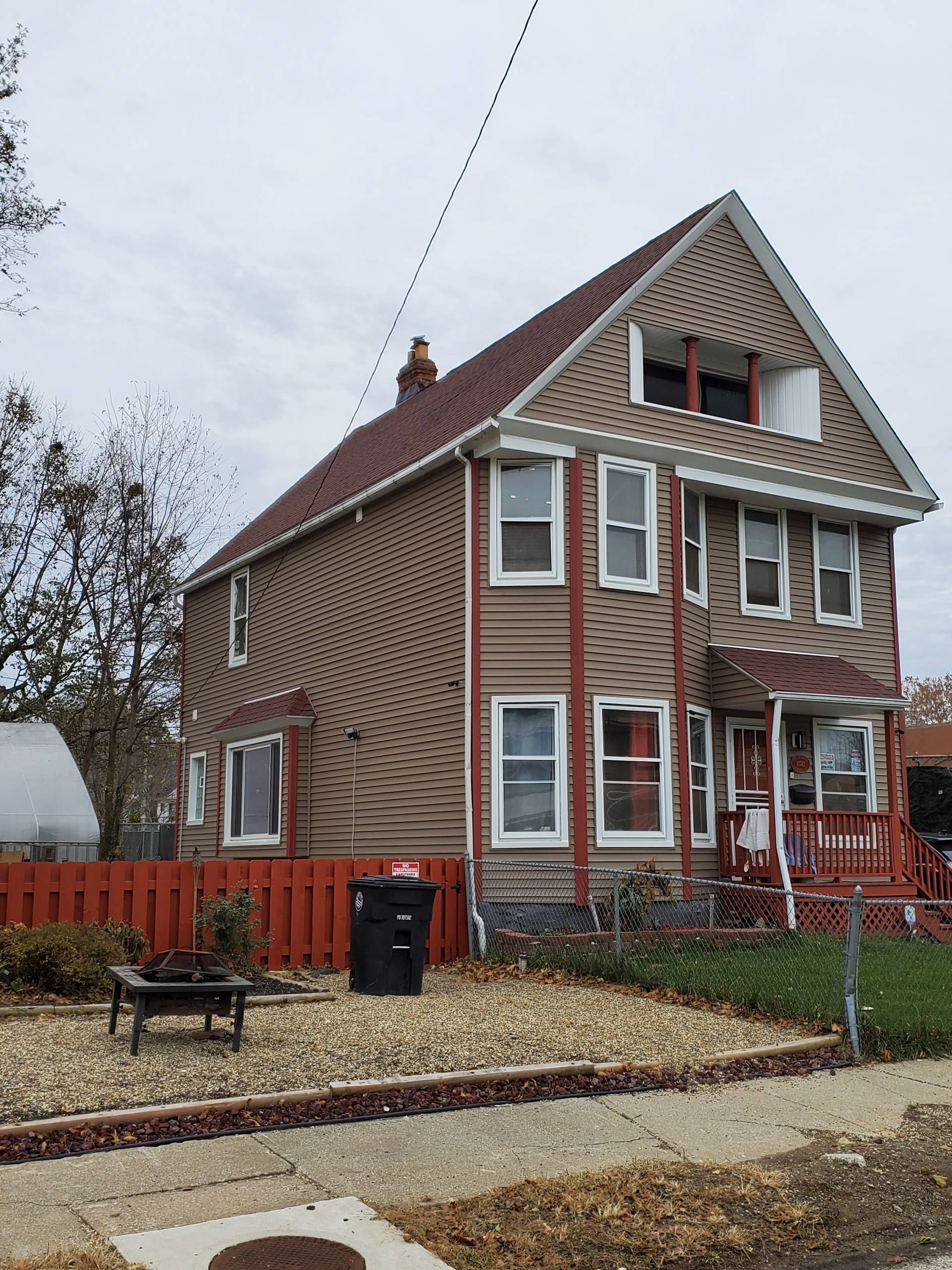 House With Trees — Cleveland, OH — Iman Roofing