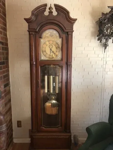 old clock with small clock besides it