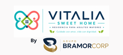 Logotipo de Vitalia Sweet Home con un icono de flor colorida y texto azul sobre un fondo blanco.