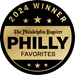 Black-and-gold “PHILLY FAVORITES” award badge with “2024 WINNER” at top and stars around the border