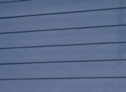Blue horizontal clapboard siding.