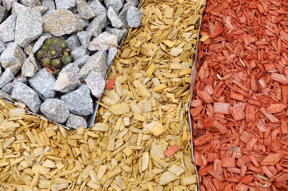 Three Garden Beds: Gray Gravel, Light Wood Chips, and Red Wood Chips — Laurieton Landscape Supplies In Lake Cathie, NSW