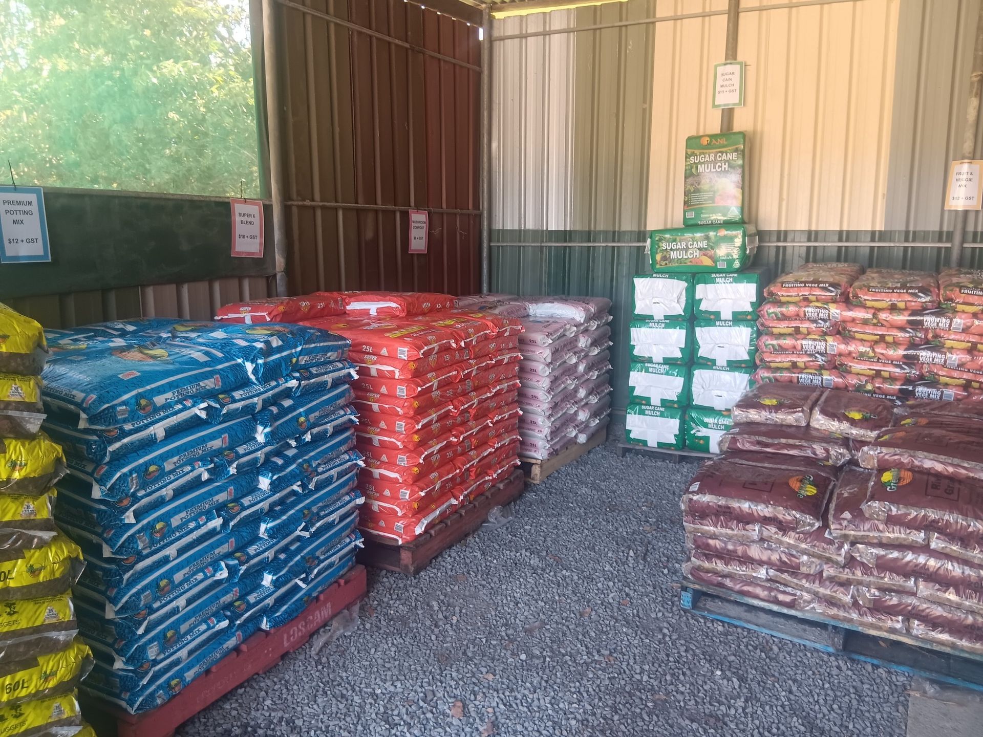 Bags of Soil on Pallets in a Storage Area; Various Colours — Laurieton Landscape Supplies In Kew, NSW