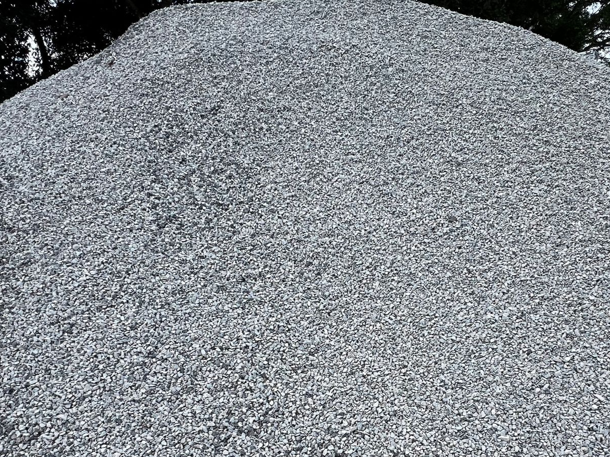 A large, triangular pile of grey, crushed gravel — Laurieton Landscape Supplies In Lake Cathie, NSW