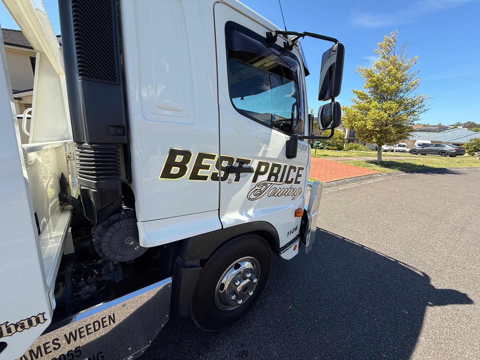 The side of a Best Price Towing tow truck — Best Price Towing in Woongarrah, NSW