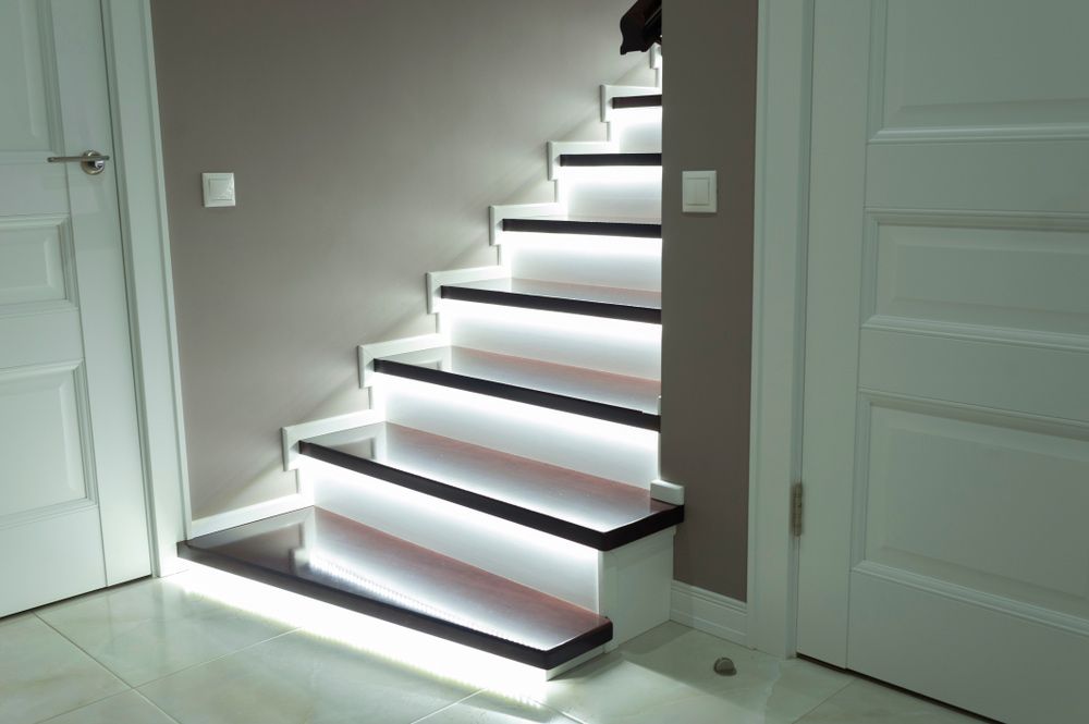 A Staircase With Lights On The Steps In A Hallway — L.A.F Electrical P/L In Umina, NSW