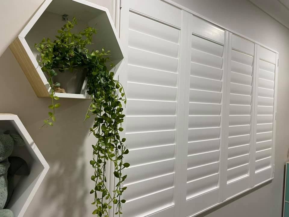 White Indoor Shutters on a Window — Whitsunday Blinds & Security In Beaconsfield, QLD