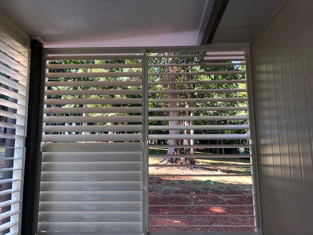 Freshly Installed Window Shutters For Enhanced Security and Privacy — Whitsunday Blinds & Security In Beaconsfield, QLD