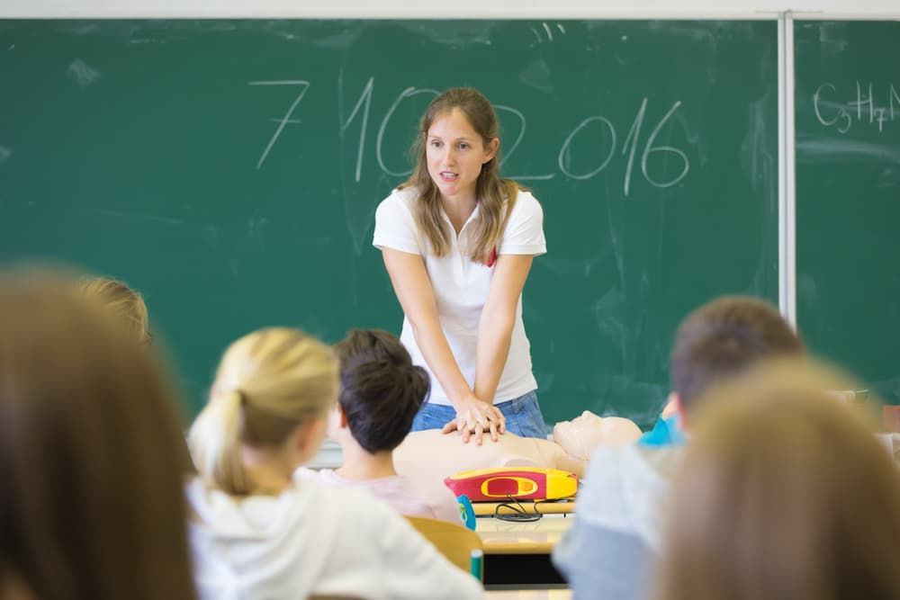 Instructor Teaching First Aid Cardiopulmonary Resuscitation Course - First Aid in Mackay, QLD