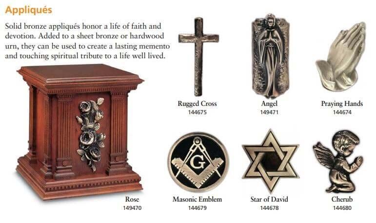 A picture of a wooden urn with various religious symbols on it