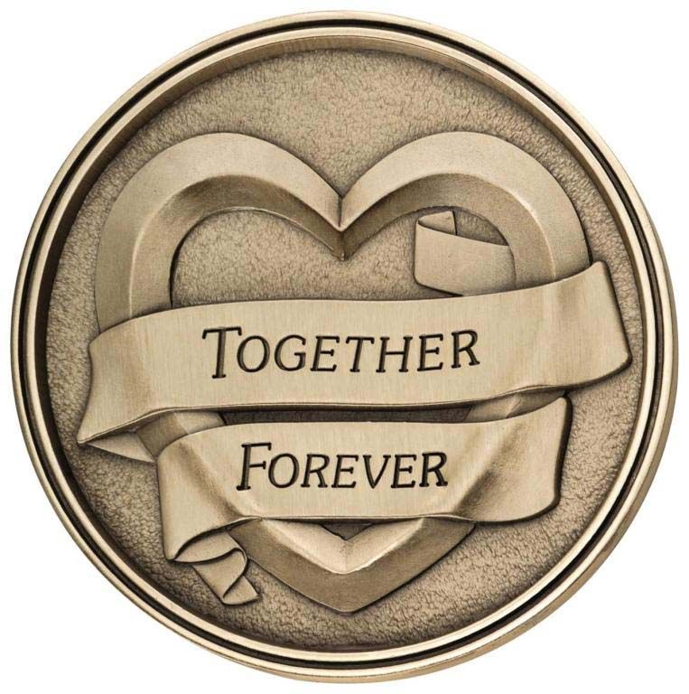 A coin with a heart and a ribbon that says together forever