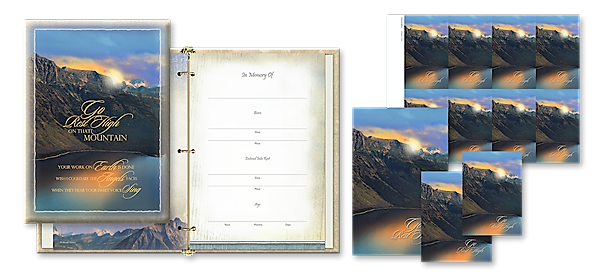 A binder with a picture of a lake and mountains on it.