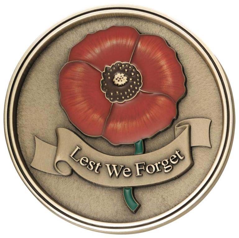 A coin that says lest we forget on it