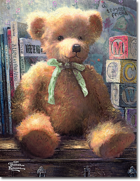 A teddy bear with a green bow is sitting on a table next to books and blocks.