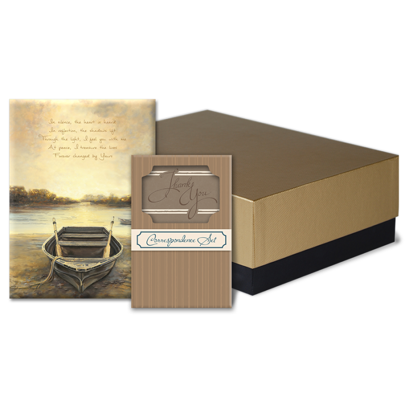 A card with a boat on it is in a box.