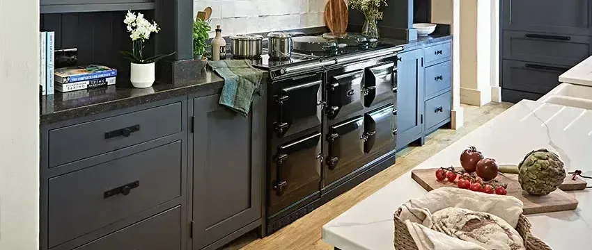 Click here to view our Special Offers on AGA Range Cookers Photograph of AGA R7 Cast Iron Electric Range Cooker installed in a kitchen