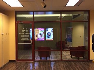 A room with a sign that says please come on it- Humane Society