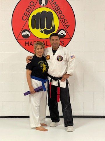 Cerio Ambrosia Martial Arts picture of owner and a female martial student.
