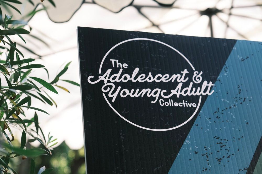 A sign that says the adolescent & young adult collective