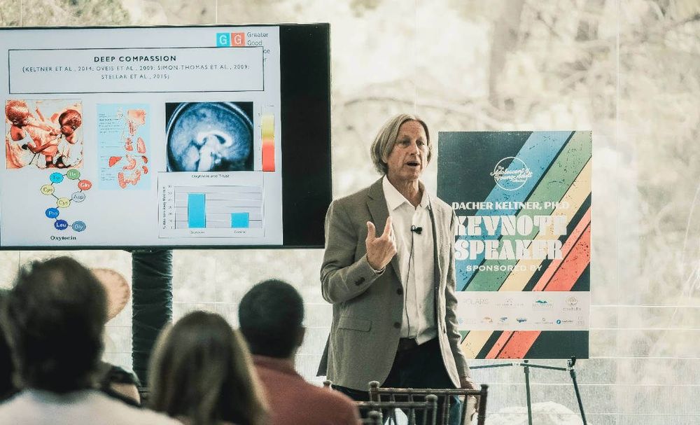 A man is giving a presentation to a group of people.