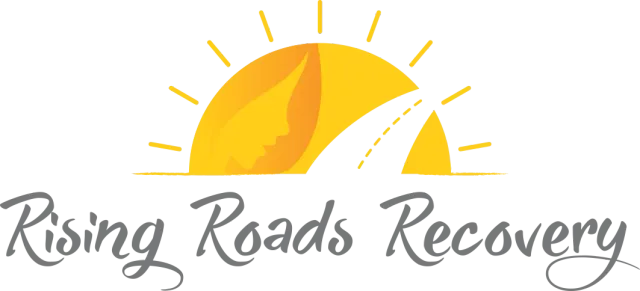 The logo for rising roads recovery shows a sun and a road.