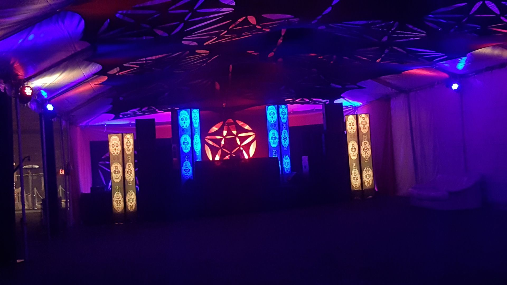 Stage with colorful lights and a star-shaped design, likely for a performance or event.