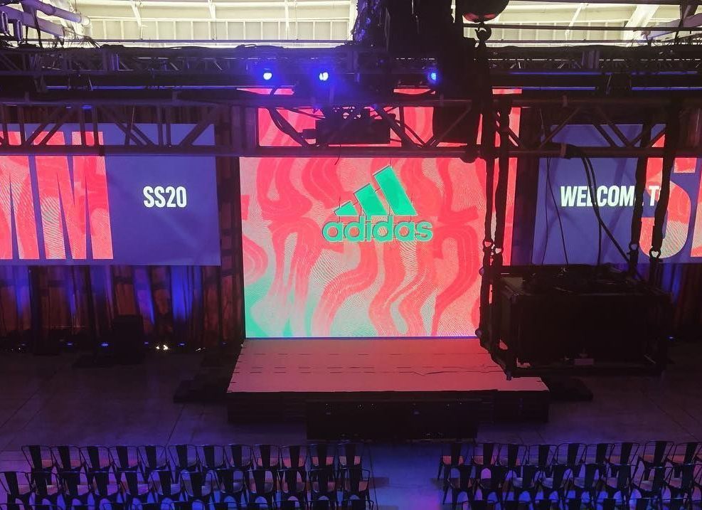Adidas stage with logo and 
