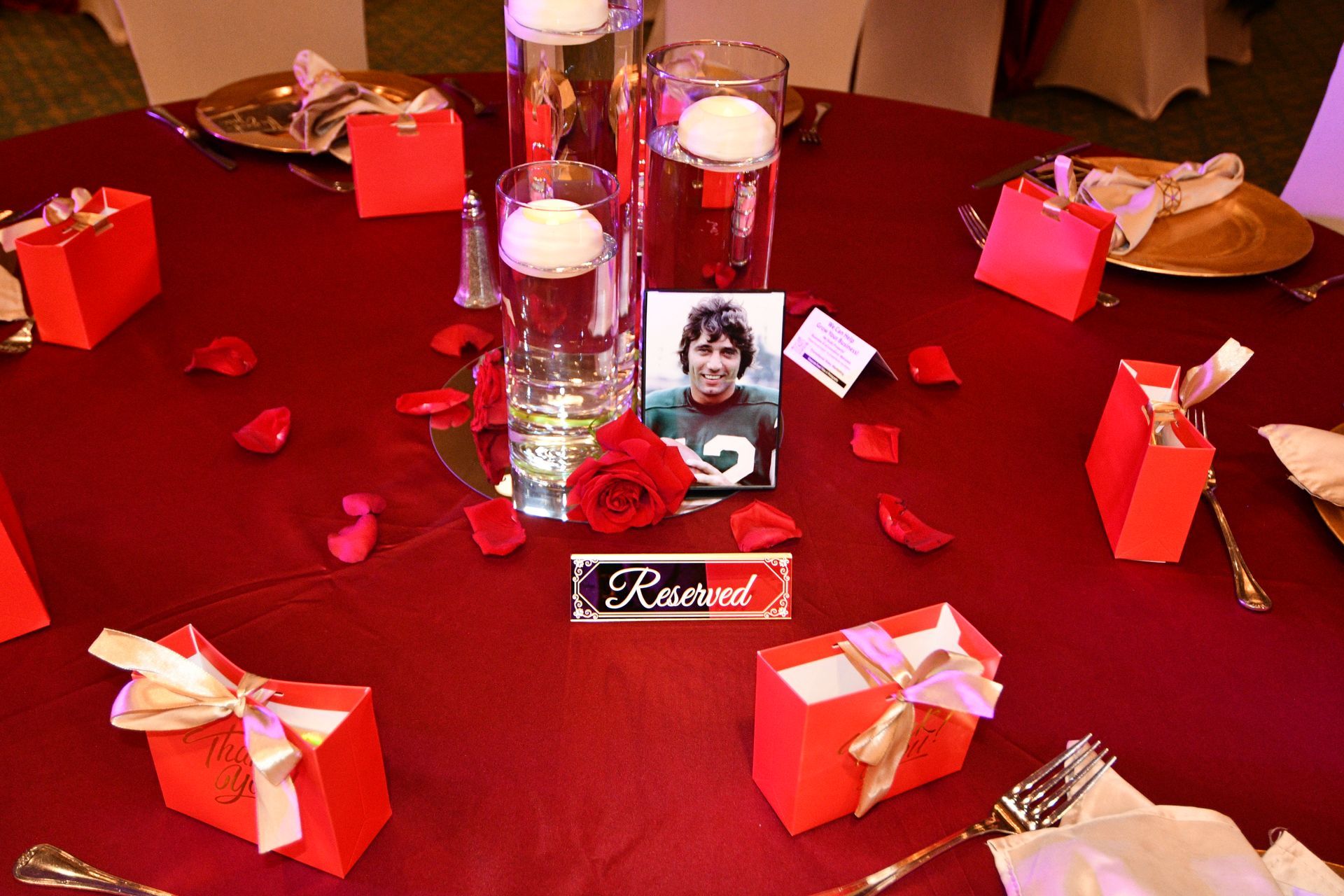 Red table setting with photo, 