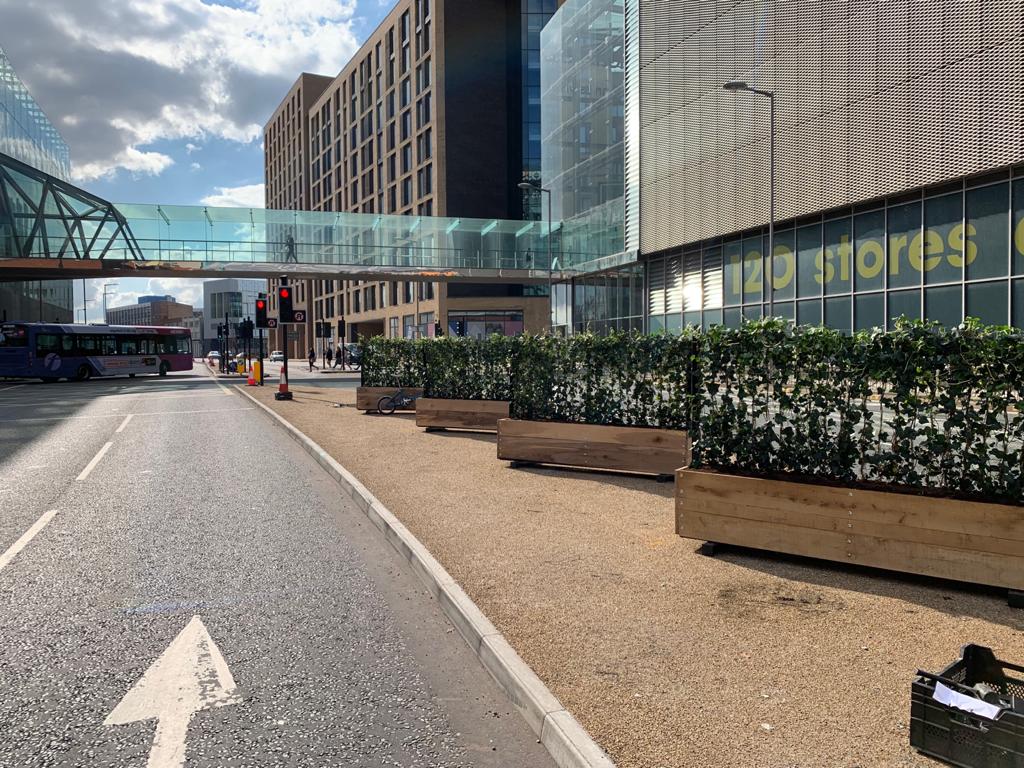 Mobilane green screens installed in timber planter boxes for Social distancing and #welcomebackfund