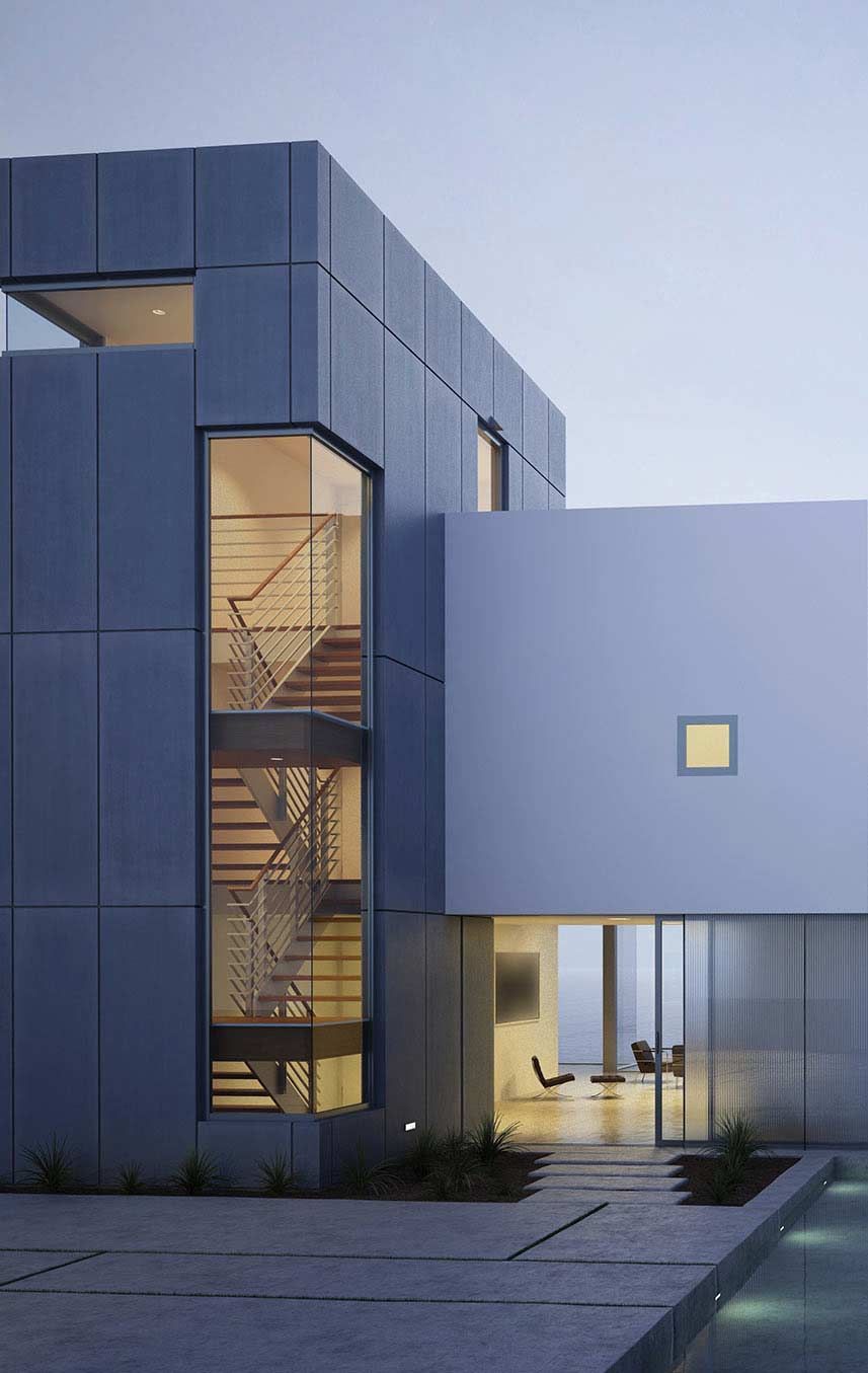 Modern two-story building with blue-gray exterior, lit stairwell, and small courtyard at dusk