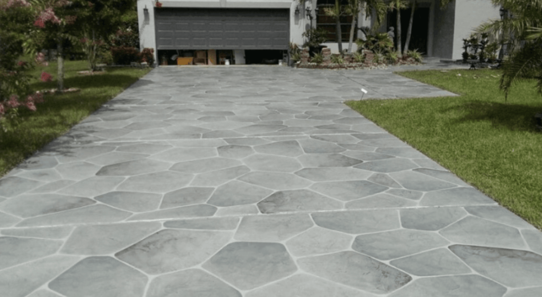 concrete contractor stamps a new backyard patio with a fresh design in downers grove IL