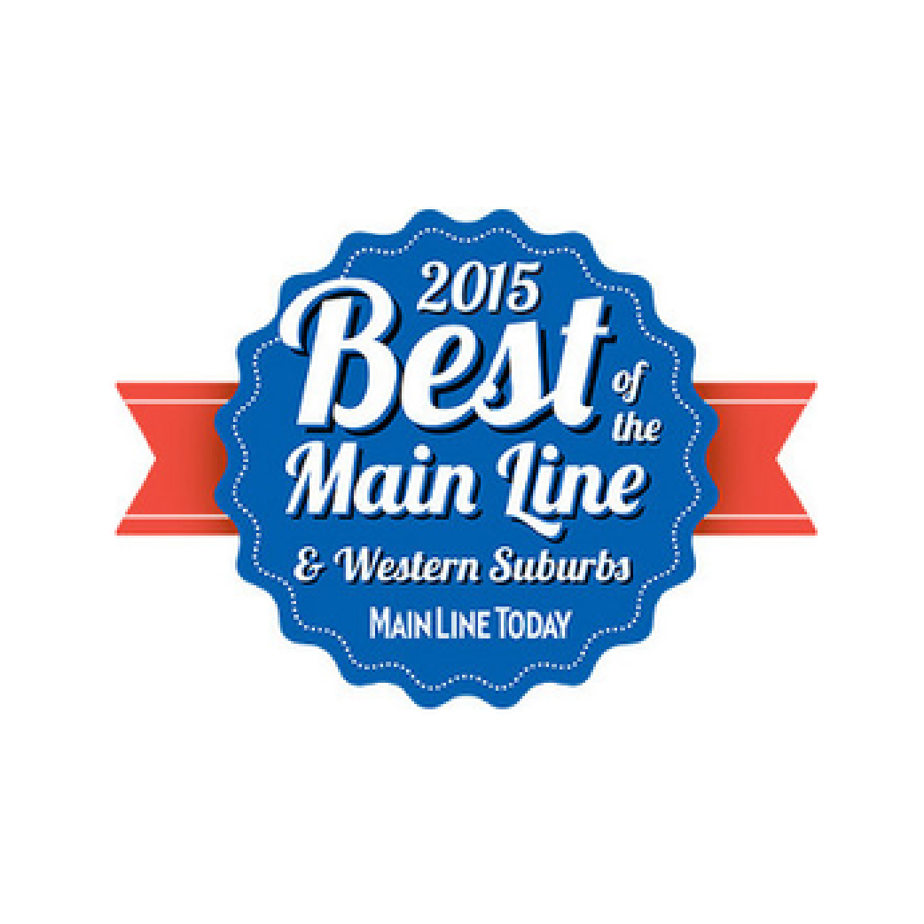 Blue “2015 Best of the Main Line & Western Suburb” award badge with red ribbons and Main Line Today branding