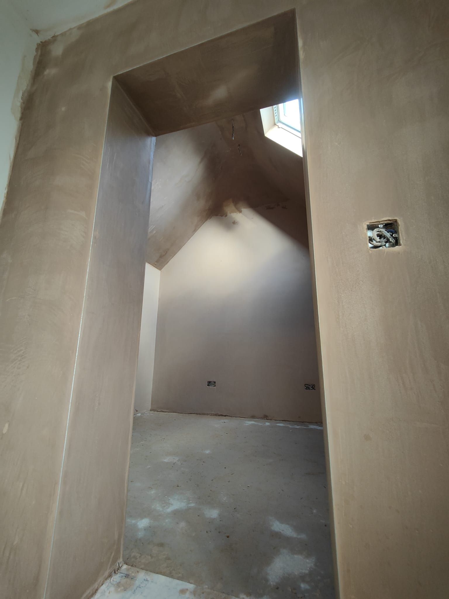Image of room that has been plastered