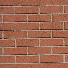 A close up of a red brick external insulation