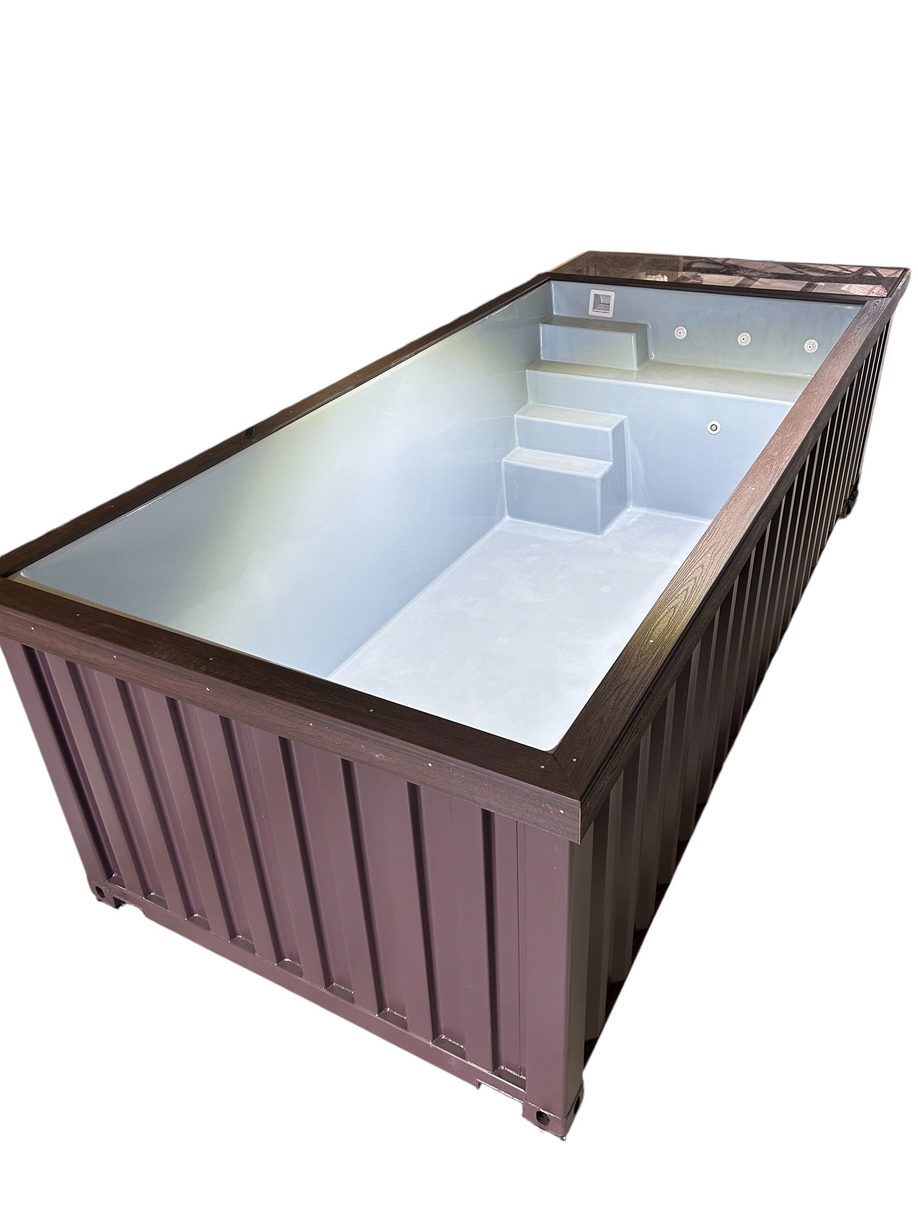 Brown container pool with built-in steps, light gray interior, and dark brown trim.