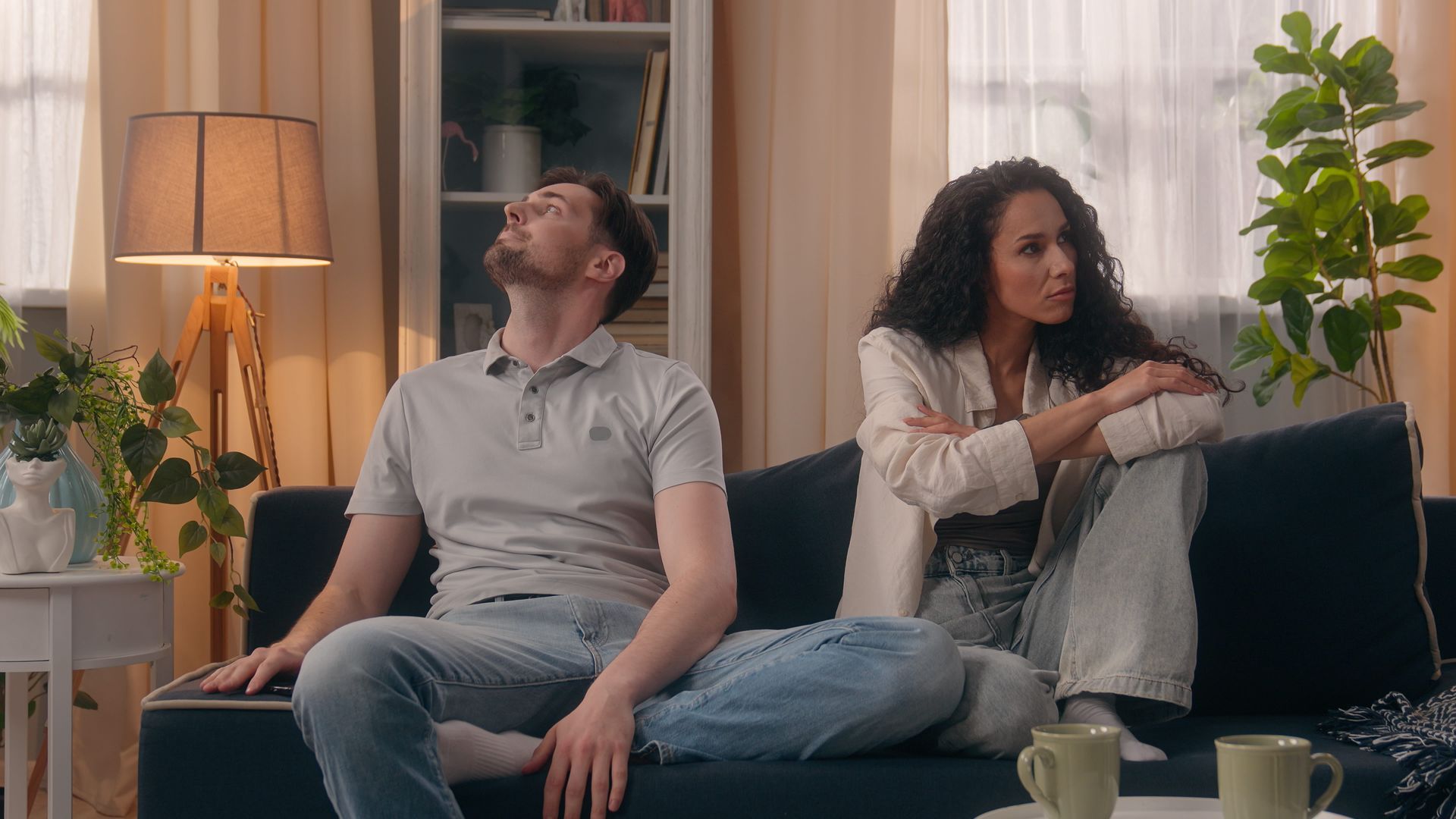 A couple sitting across from a therapist, representing couples therapy support with Karen Collins LM