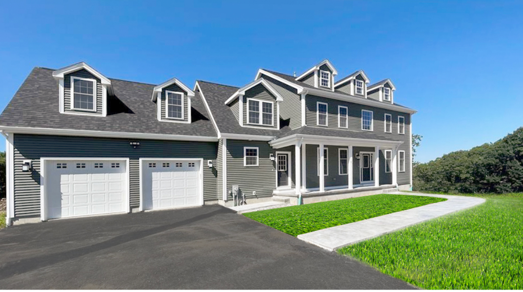 Two-story gray house with white trim, a two-car garage, and a porch on a green lawn.