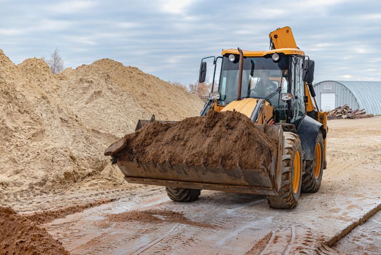 Trenching and backfill sand
