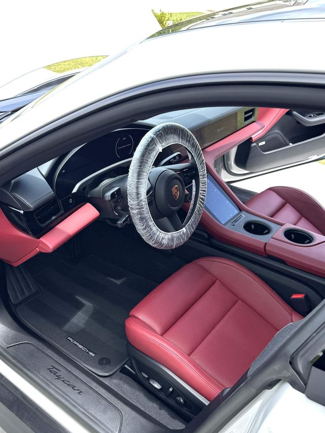 Porsche Taycan interior with red leather seats after detailing, Ongowash mobile detailing serving Cypress, TX