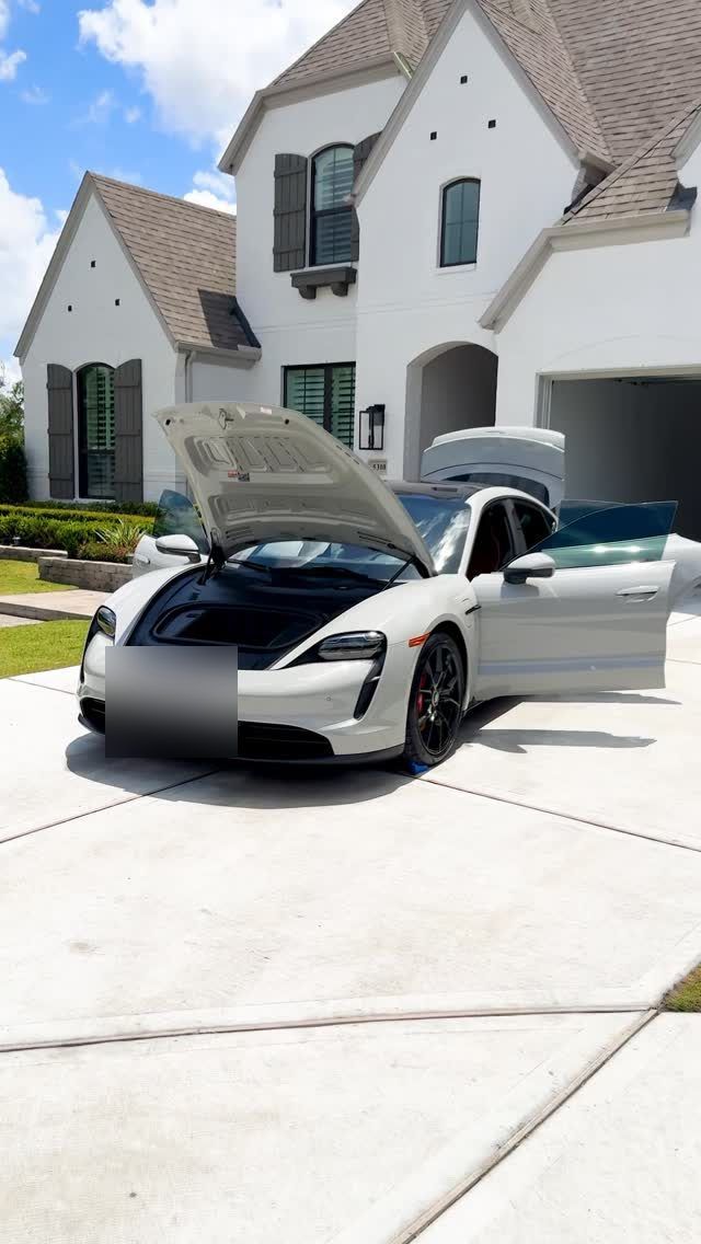 White Porsche Taycan with doors and frunk open during a mobile EV detail, Ongowash mobile detailing serving Katy, TX