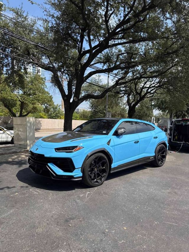 Sky-blue Lamborghini Urus Performante with a fresh exterior detail, Ongowash mobile detailing serving Katy, TX
