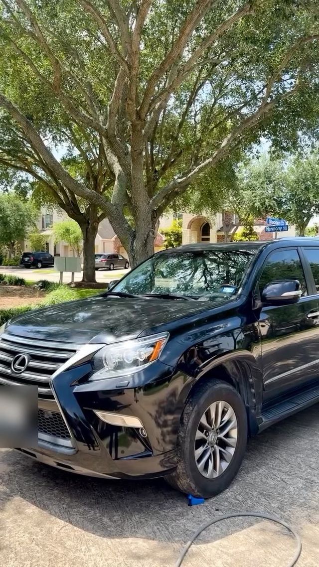 Black Lexus GX with glossy paint after an exterior detail, Ongowash mobile detailing serving Sugar Land, TX